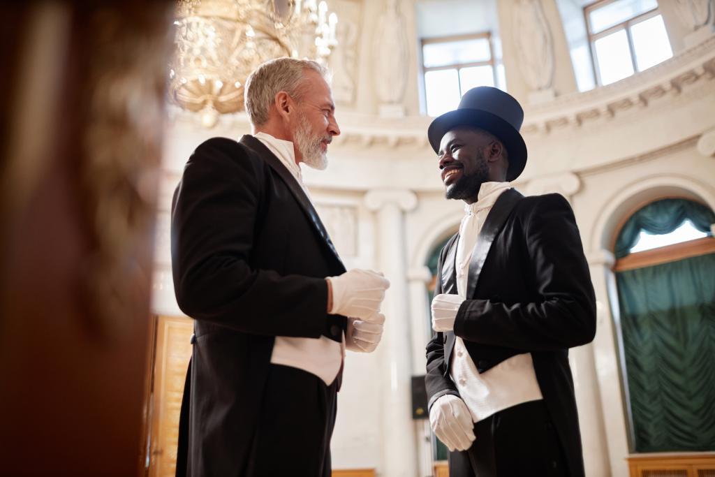 A low-angle photo of two dapper gentlemen who know how to dress for a debutante ball.