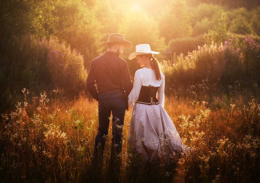 Beautiful country wedding couple in autumn sunset